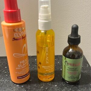 Hair Bundle Includes: Hair Slayer Spray. Biolage Serum. Mielle Rosemary Oil